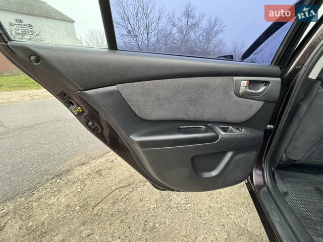 Коричневий Кіа Маджентіс, об'ємом двигуна 2 л та пробігом 157 тис. км за 5900 $, фото 31 на Automoto.ua