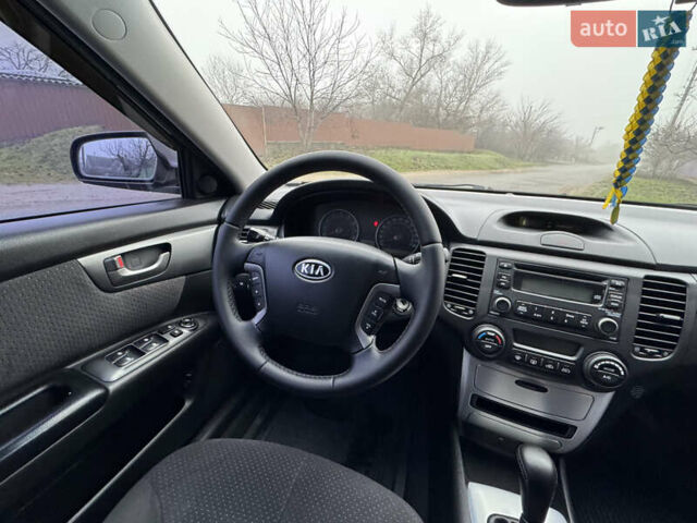 Коричневий Кіа Маджентіс, об'ємом двигуна 2 л та пробігом 157 тис. км за 5900 $, фото 26 на Automoto.ua