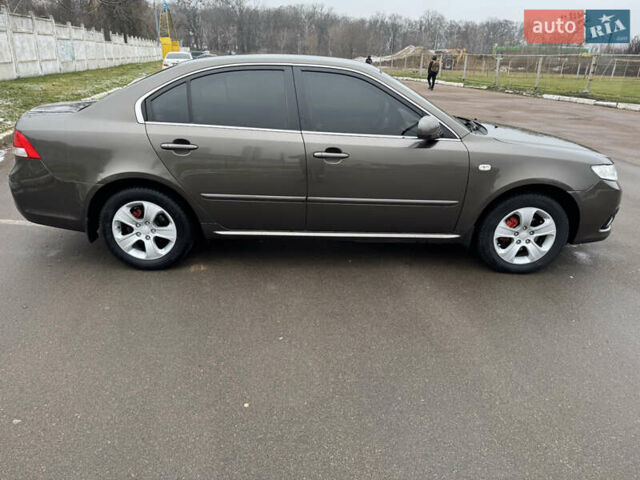 Коричневый Киа Маджентис, объемом двигателя 2 л и пробегом 263 тыс. км за 7000 $, фото 6 на Automoto.ua