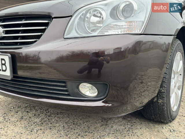 Коричневий Кіа Маджентіс, об'ємом двигуна 2 л та пробігом 157 тис. км за 5900 $, фото 18 на Automoto.ua