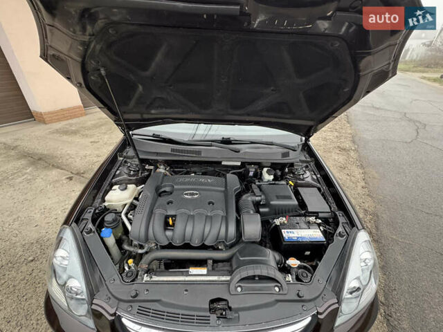 Коричневий Кіа Маджентіс, об'ємом двигуна 2 л та пробігом 157 тис. км за 5900 $, фото 35 на Automoto.ua