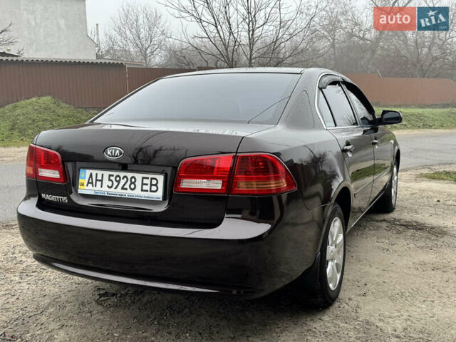 Коричневий Кіа Маджентіс, об'ємом двигуна 2 л та пробігом 157 тис. км за 5900 $, фото 7 на Automoto.ua