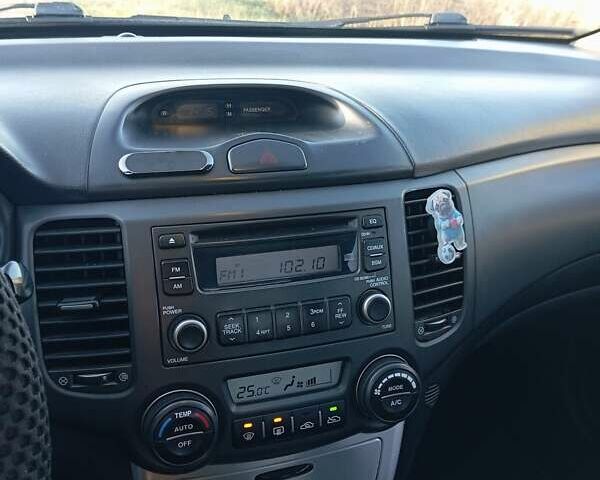 Коричневый Киа Маджентис, объемом двигателя 2 л и пробегом 256 тыс. км за 4600 $, фото 1 на Automoto.ua