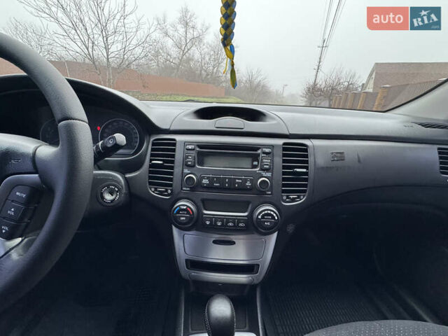 Коричневий Кіа Маджентіс, об'ємом двигуна 2 л та пробігом 157 тис. км за 5900 $, фото 27 на Automoto.ua