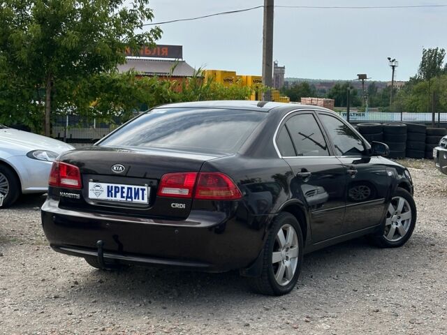 Красный Киа Маджентис, объемом двигателя 2 л и пробегом 255 тыс. км за 6000 $, фото 3 на Automoto.ua