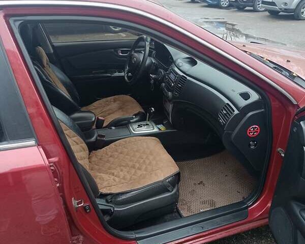 Кіа Маджентіс 2007 у Києві на Automoto.ua Червоний Кіа Маджентіс, об'ємом двигуна 2 л та пробігом 235 тис. км за 5000 $, фото 6 на Automoto.ua