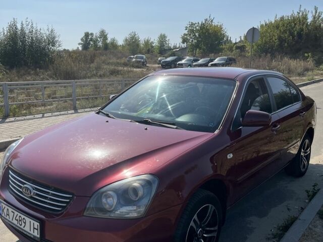 Красный Киа Маджентис, объемом двигателя 2 л и пробегом 190 тыс. км за 5900 $, фото 2 на Automoto.ua