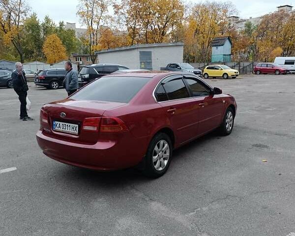Кіа Маджентіс 2007 у Києві на Automoto.ua Червоний Кіа Маджентіс, об'ємом двигуна 2 л та пробігом 235 тис. км за 5000 $, фото 8 на Automoto.ua