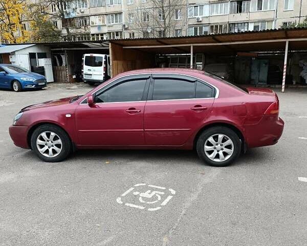 Кіа Маджентіс 2007 у Києві на Automoto.ua Червоний Кіа Маджентіс, об'ємом двигуна 2 л та пробігом 235 тис. км за 5000 $, фото 13 на Automoto.ua