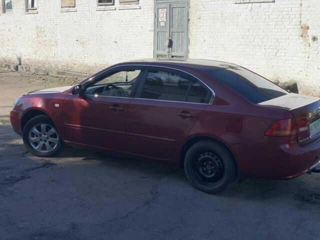Червоний Кіа Маджентіс, об'ємом двигуна 2 л та пробігом 339 тис. км за 3200 $, фото 1 на Automoto.ua