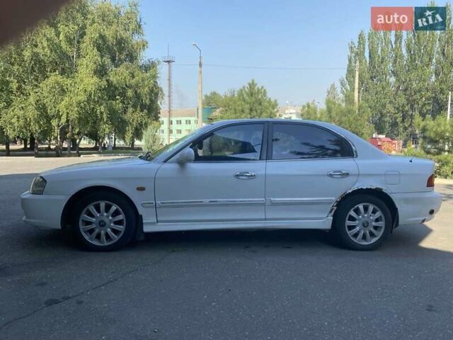 Киа Маджентис, объемом двигателя 2 л и пробегом 205 тыс. км за 4200 $, фото 5 на Automoto.ua