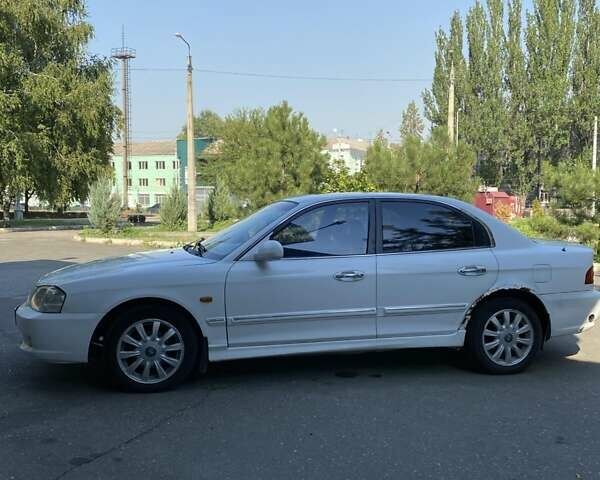 Киа Маджентис, объемом двигателя 2 л и пробегом 205 тыс. км за 4200 $, фото 13 на Automoto.ua