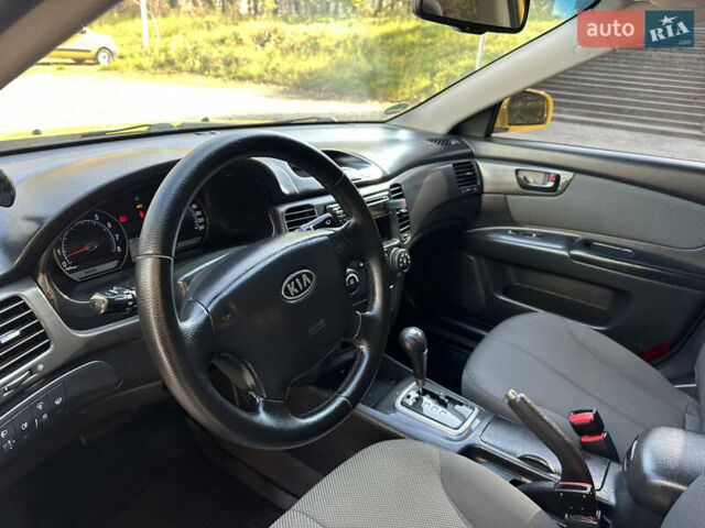 Жовтий Кіа Маджентіс, об'ємом двигуна 2 л та пробігом 257 тис. км за 4300 $, фото 51 на Automoto.ua