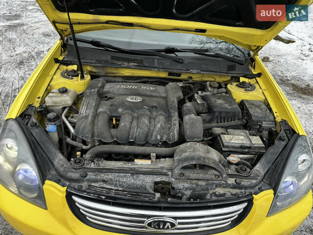 Желтый Киа Маджентис, объемом двигателя 2 л и пробегом 258 тыс. км за 3950 $, фото 57 на Automoto.ua