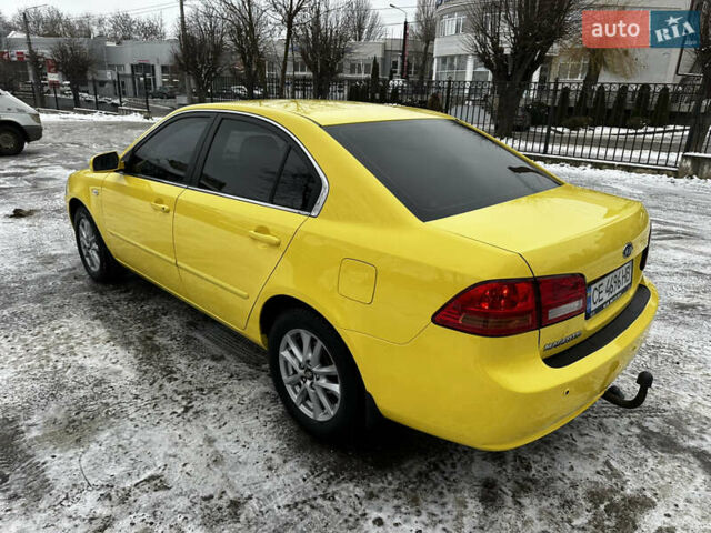 Желтый Киа Маджентис, объемом двигателя 2 л и пробегом 258 тыс. км за 3950 $, фото 2 на Automoto.ua