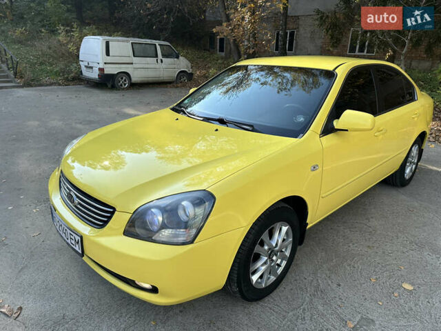 Жовтий Кіа Маджентіс, об'ємом двигуна 2 л та пробігом 257 тис. км за 4300 $, фото 5 на Automoto.ua