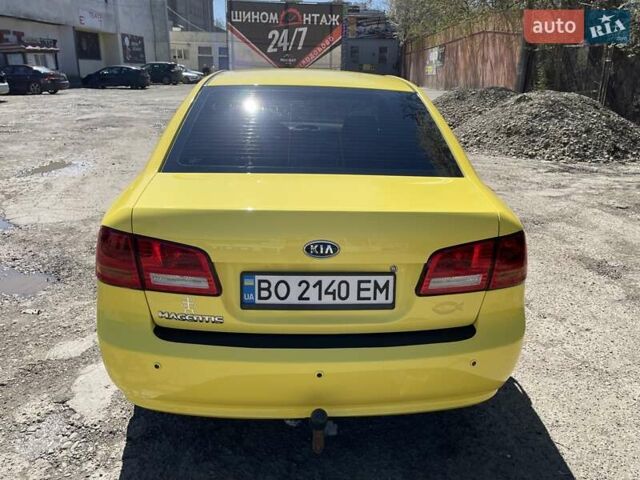 Желтый Киа Маджентис, объемом двигателя 2 л и пробегом 250 тыс. км за 5200 $, фото 1 на Automoto.ua