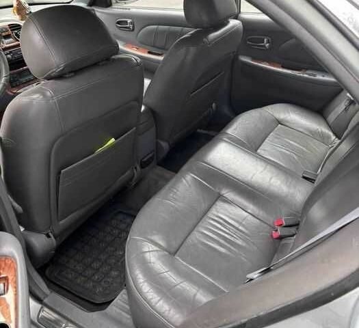 Серый Киа Маджентис, объемом двигателя 2.5 л и пробегом 335 тыс. км за 1800 $, фото 4 на Automoto.ua