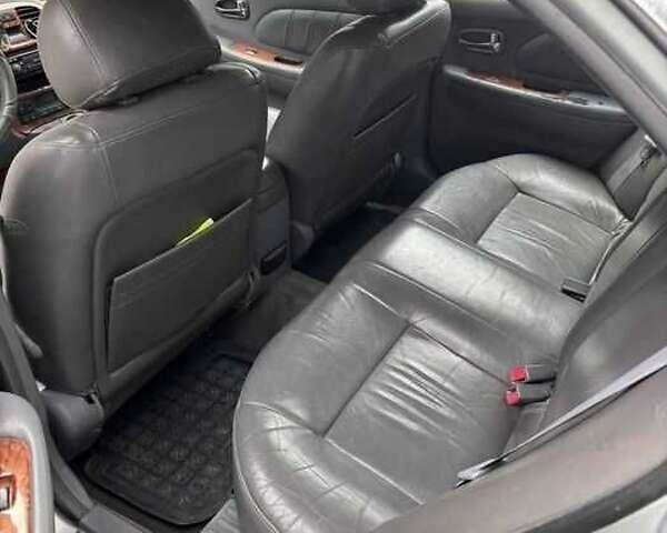 Сірий Кіа Маджентіс, об'ємом двигуна 2.5 л та пробігом 335 тис. км за 1800 $, фото 3 на Automoto.ua