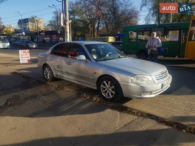 Сірий Кіа Маджентіс, об'ємом двигуна 2.5 л та пробігом 316 тис. км за 3750 $, фото 6 на Automoto.ua