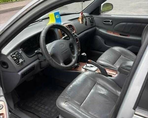 Сірий Кіа Маджентіс, об'ємом двигуна 2.5 л та пробігом 335 тис. км за 1800 $, фото 2 на Automoto.ua