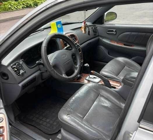 Серый Киа Маджентис, объемом двигателя 2.5 л и пробегом 335 тыс. км за 1800 $, фото 3 на Automoto.ua