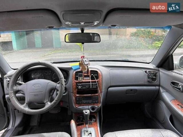 Сірий Кіа Маджентіс, об'ємом двигуна 2.5 л та пробігом 335 тис. км за 1800 $, фото 4 на Automoto.ua