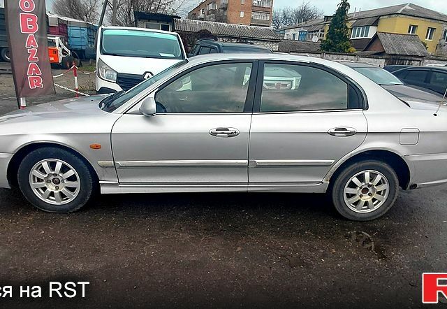 Сірий Кіа Маджентіс, об'ємом двигуна 2 л та пробігом 280 тис. км за 2700 $, фото 6 на Automoto.ua