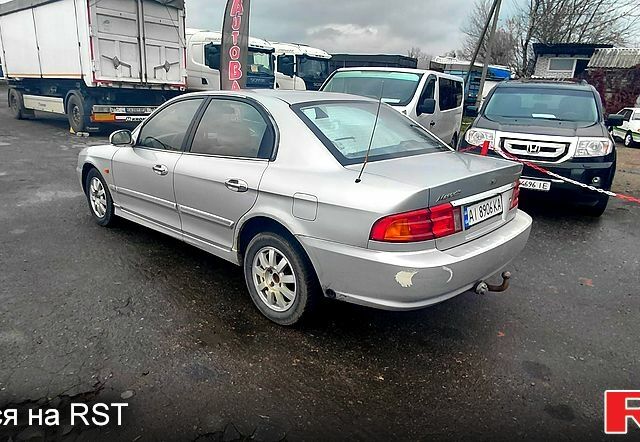 Сірий Кіа Маджентіс, об'ємом двигуна 2 л та пробігом 280 тис. км за 2700 $, фото 1 на Automoto.ua