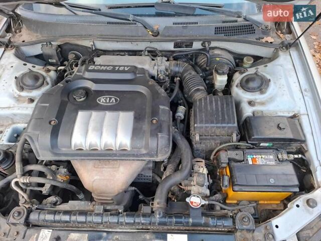 Сірий Кіа Маджентіс, об'ємом двигуна 2 л та пробігом 340 тис. км за 2800 $, фото 8 на Automoto.ua
