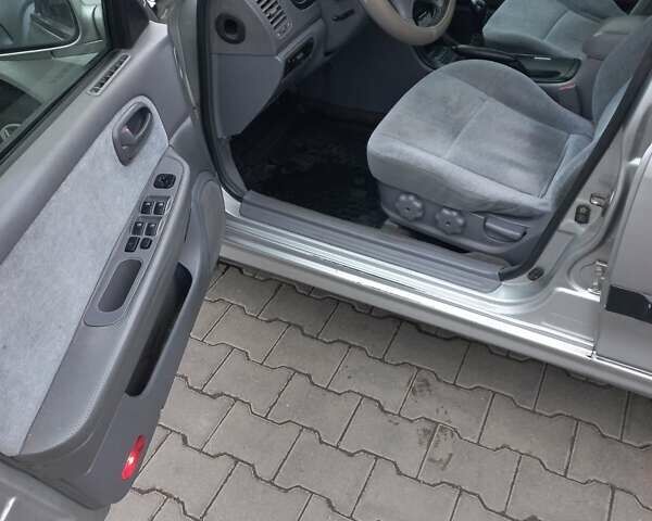 Серый Киа Маджентис, объемом двигателя 2 л и пробегом 270 тыс. км за 2600 $, фото 4 на Automoto.ua