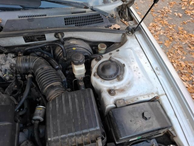 Серый Киа Маджентис, объемом двигателя 2 л и пробегом 340 тыс. км за 2800 $, фото 11 на Automoto.ua