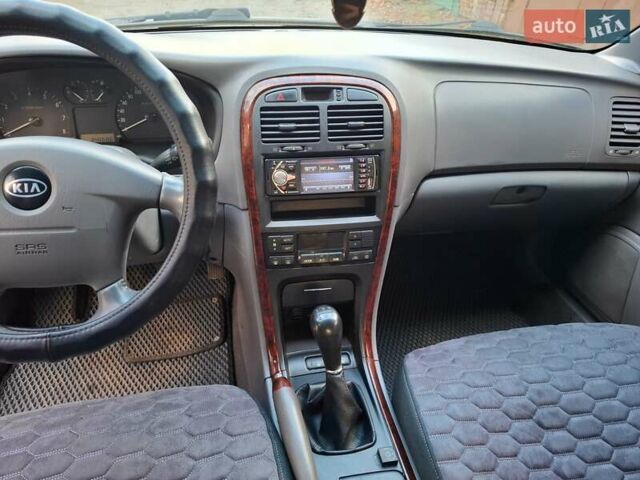 Сірий Кіа Маджентіс, об'ємом двигуна 2 л та пробігом 340 тис. км за 2800 $, фото 5 на Automoto.ua