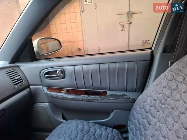 Сірий Кіа Маджентіс, об'ємом двигуна 2 л та пробігом 340 тис. км за 2800 $, фото 6 на Automoto.ua