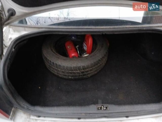 Серый Киа Маджентис, объемом двигателя 2 л и пробегом 271 тыс. км за 3200 $, фото 10 на Automoto.ua