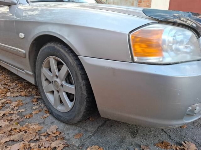 Серый Киа Маджентис, объемом двигателя 2 л и пробегом 340 тыс. км за 2800 $, фото 6 на Automoto.ua