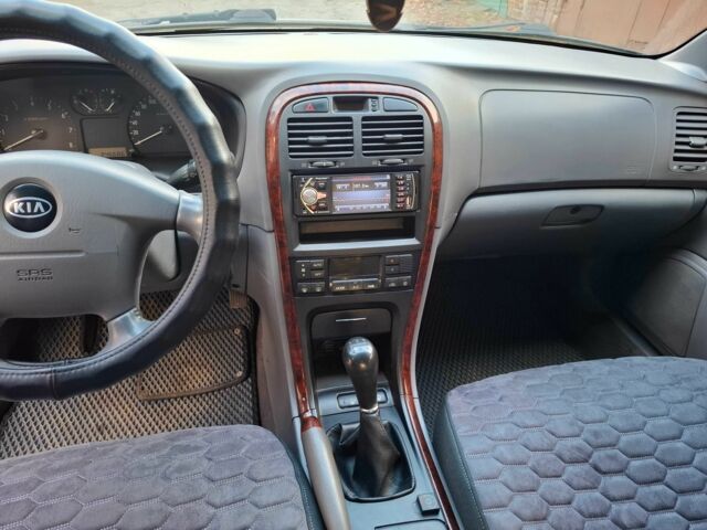 Серый Киа Маджентис, объемом двигателя 2 л и пробегом 340 тыс. км за 2800 $, фото 7 на Automoto.ua