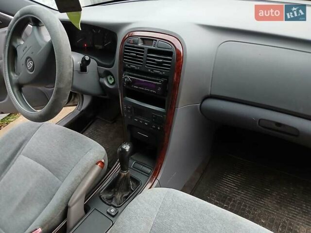 Серый Киа Маджентис, объемом двигателя 2 л и пробегом 271 тыс. км за 3200 $, фото 13 на Automoto.ua