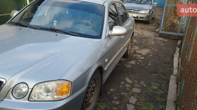 Сірий Кіа Маджентіс, об'ємом двигуна 2 л та пробігом 190 тис. км за 3500 $, фото 3 на Automoto.ua