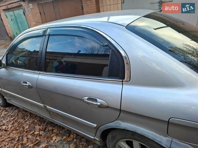 Сірий Кіа Маджентіс, об'ємом двигуна 2 л та пробігом 340 тис. км за 2800 $, фото 1 на Automoto.ua