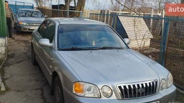Сірий Кіа Маджентіс, об'ємом двигуна 2 л та пробігом 190 тис. км за 3500 $, фото 4 на Automoto.ua