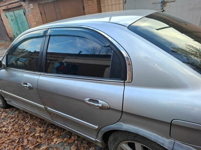 Серый Киа Маджентис, объемом двигателя 2 л и пробегом 340 тыс. км за 2800 $, фото 2 на Automoto.ua