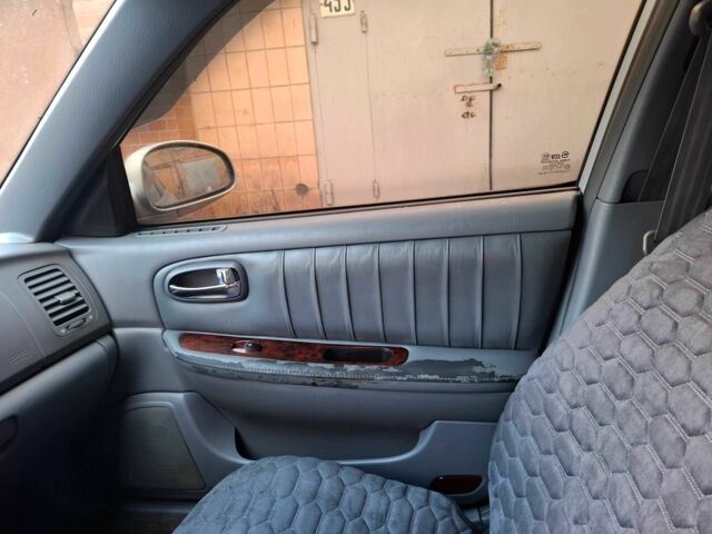 Серый Киа Маджентис, объемом двигателя 2 л и пробегом 340 тыс. км за 2800 $, фото 8 на Automoto.ua