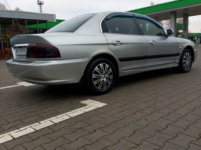 Серый Киа Маджентис, объемом двигателя 2 л и пробегом 270 тыс. км за 2600 $, фото 1 на Automoto.ua