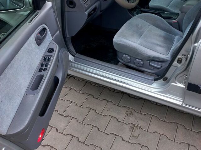 Серый Киа Маджентис, объемом двигателя 2 л и пробегом 270 тыс. км за 2600 $, фото 4 на Automoto.ua