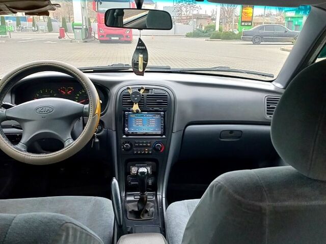 Серый Киа Маджентис, объемом двигателя 2 л и пробегом 270 тыс. км за 2600 $, фото 6 на Automoto.ua