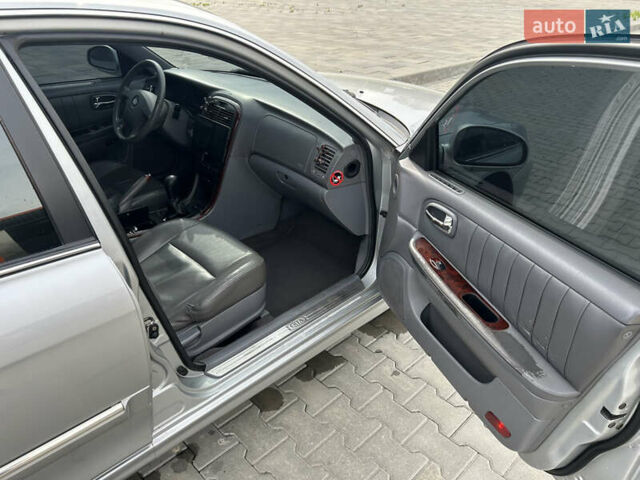 Сірий Кіа Маджентіс, об'ємом двигуна 2 л та пробігом 265 тис. км за 4700 $, фото 11 на Automoto.ua