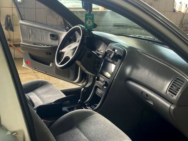 Серый Киа Маджентис, объемом двигателя 2 л и пробегом 234 тыс. км за 3200 $, фото 11 на Automoto.ua