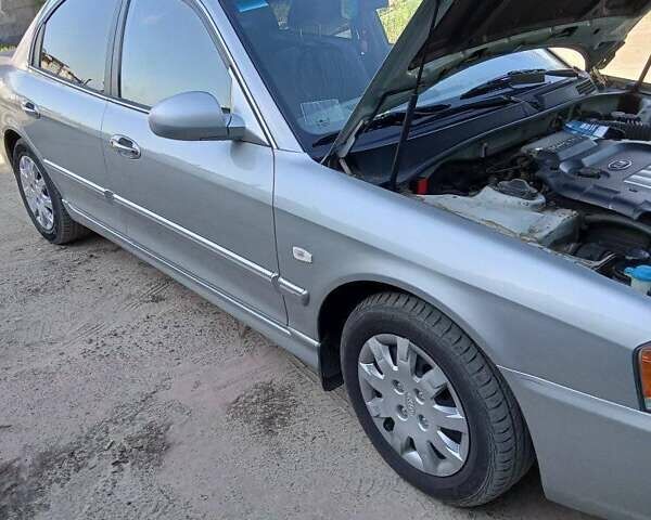 Сірий Кіа Маджентіс, об'ємом двигуна 2 л та пробігом 84 тис. км за 7000 $, фото 8 на Automoto.ua
