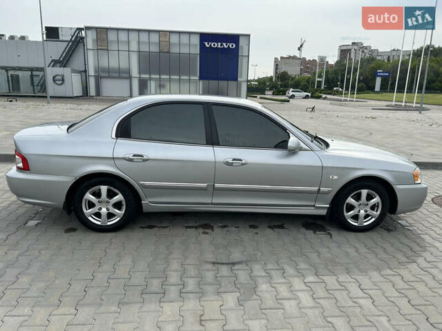 Сірий Кіа Маджентіс, об'ємом двигуна 2 л та пробігом 265 тис. км за 4700 $, фото 20 на Automoto.ua
